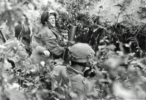 Mortar crew of the Border Regiment engaged in fire mission at Oosterbeek